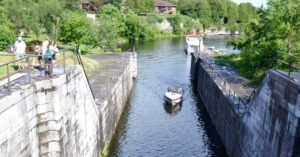 people watching a boat pass through lock 34 one of the things to do in fenelon falls ontario